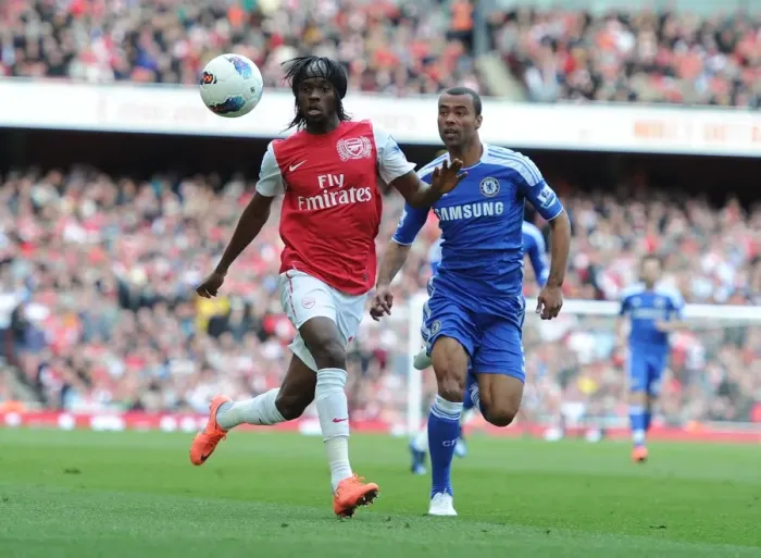 Framed Print : Gervinho vs. Ashley Cole: Intense Rivalry at the Emirates - Arsenal vs. Chelsea, Premier League 2011-12