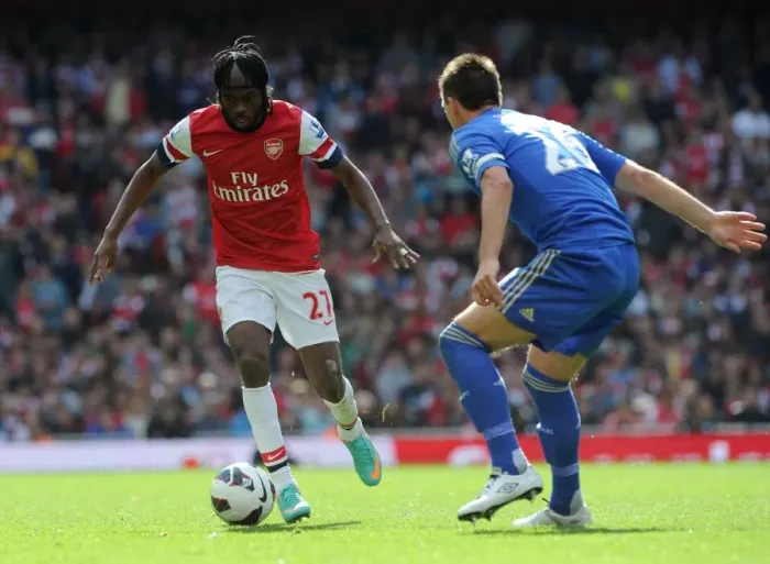 Framed Print : Gervinho vs John Terry: Intense Rivalry at the Emirates - Arsenal v Chelsea (2012-13)