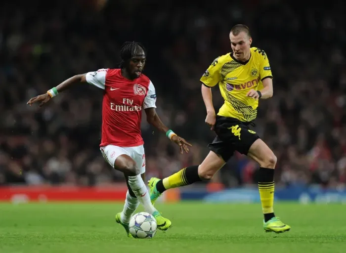 Framed Print : Gervinho vs. Kevin Grosskreutz: Battle at the Emirates - Arsenal vs. Borussia Dortmund, UEFA Champions League, 2011 Framed Print : Gervinho vs. Kevin Grosskreutz: Battle at the Emirates - Arsenal vs. Borussia Dortmund, UEFA Champions League, 2011