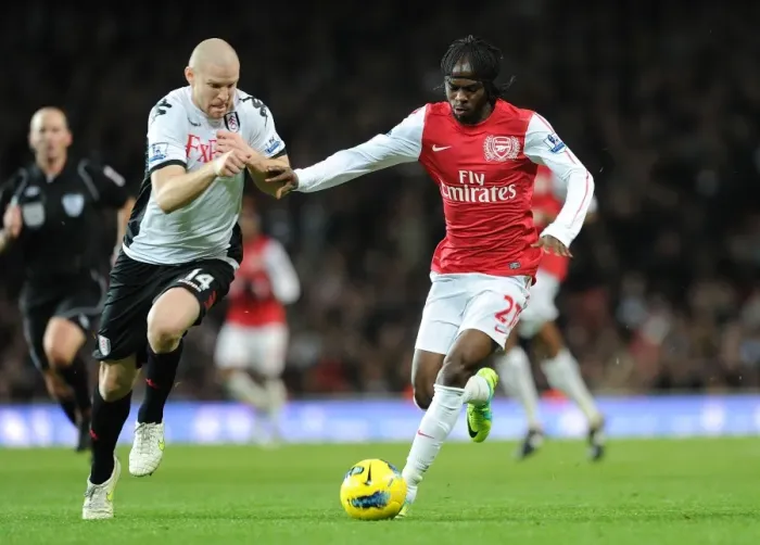 Framed Print : Gervinho vs. Philippe Senderos: A Battle Within Arsenal's Ranks (Arsenal v Fulham 2011-12)