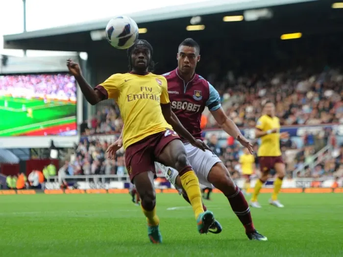 Framed Print : Gervinho vs. Winston Reid: A Football Showdown at Boleyn Ground - Arsenal vs. West Ham United, Premier League 2012-13 Framed Print : Gervinho vs. Winston Reid: A Football Showdown at Boleyn Ground - Arsenal vs. West Ham United, Premier League 2012-13