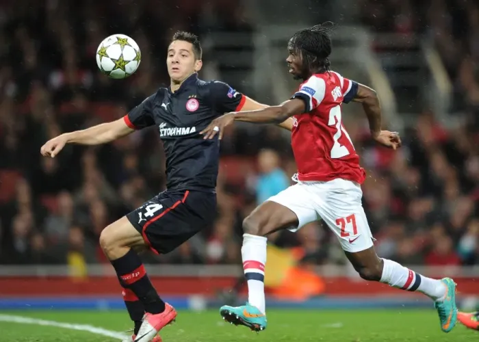 Framed Print : Gervinho's Brace: Arsenal's Triumph over Olympiacos in Champions League - 3-1