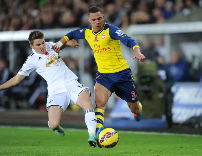 Framed Print : Gibbs vs Carroll: A Premier League Battle - Swansea v Arsenal (2014-15) Framed Print : Gibbs vs Carroll: A Premier League Battle - Swansea v Arsenal (2014-15)