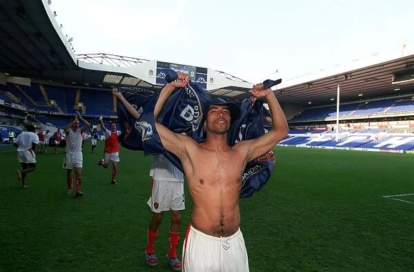 Gilberto (Arsenal) celebrates winning the league. Tottenham Hotspur v Arsenal