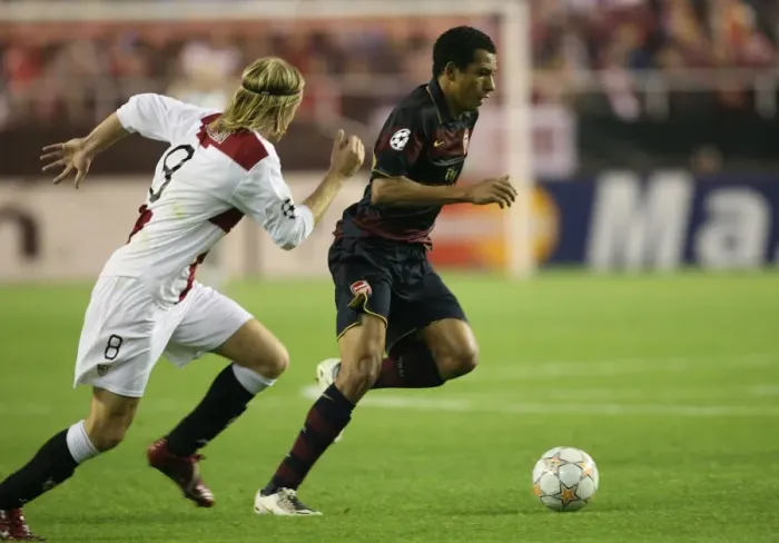 Framed Print : Gilberto (Arsenal) Chrisitan Poulsen (Seville)