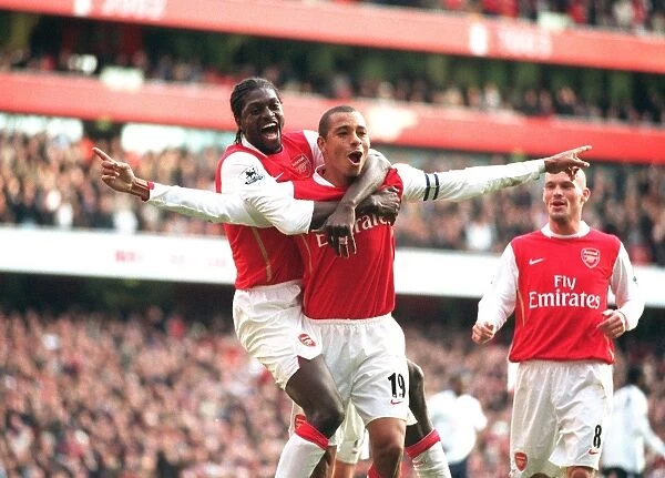 Gilberto celebrates scoring his 2nd and Arsenals 3rd from the penalty spot with Emmanuel Adebayor. Arsenal 3: 1 Tottenham Hotspur. FA Premiership. Emirates Stadium, London, 2  /  12  /  06. Credit: Arsenal Football Club  / 