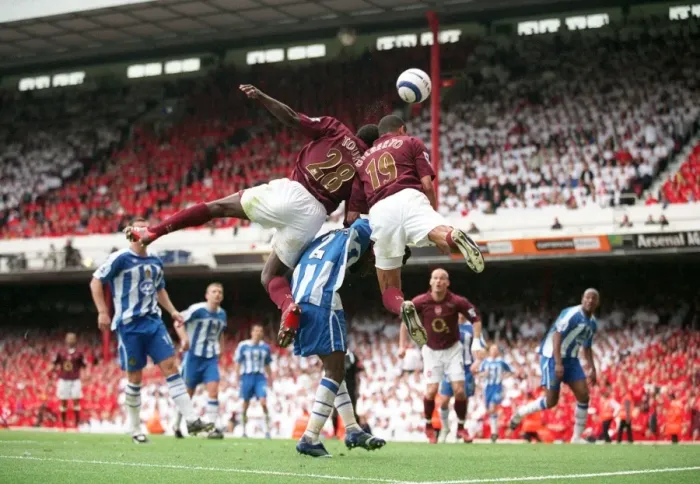 Framed Print : Gilberto and Kolo Toure (Arsenal) jump for the ball with Pascal Chimbonda (Wigan) Framed Print : Gilberto and Kolo Toure (Arsenal) jump for the ball with Pascal Chimbonda (Wigan)