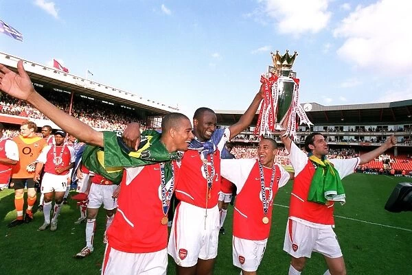 Gilberto, Patrick Vieira, Gael Clichy and Edu (Arsenal) with the Premiership trophy