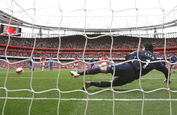 Gilberto shoots past Chelsea goalkeeper Petr Cech to score the Arsenal from the penalty spot