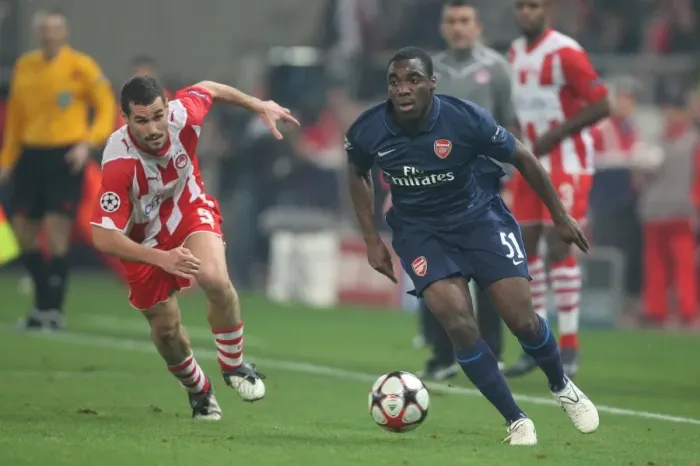 Framed Print : Gilles Sunu (Arsenal) Giorgos Galitsios (Olympiacos). Olympiacos 1: 0 Arsenal