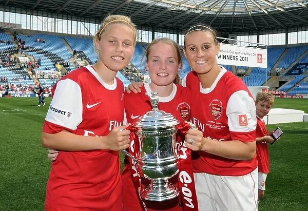 Gilly Flaherty, Kim Little and Julie Fleeting (Arsenal) with the FA Cup Trophy
