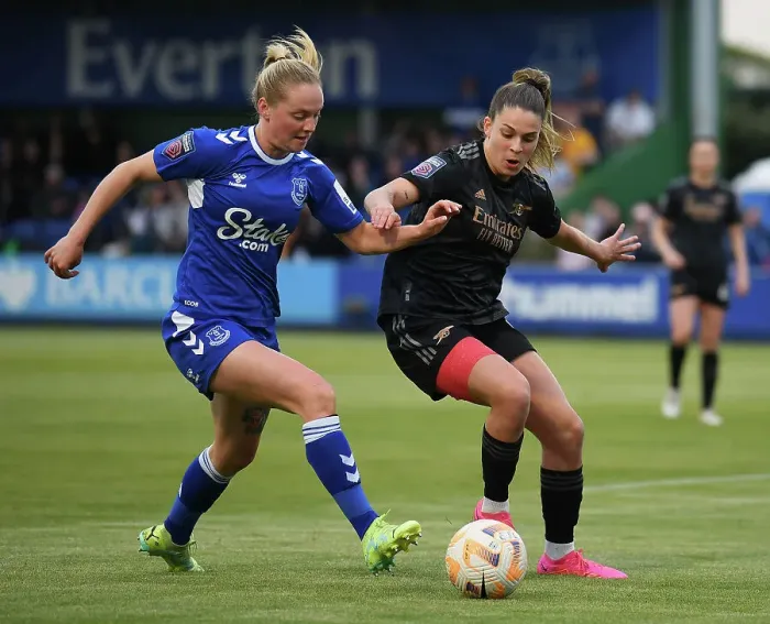 Framed Print : Gio Queiroz vs. Lucy Hope: Intense Battle for Possession in Everton vs. Arsenal Women's Super League Match
