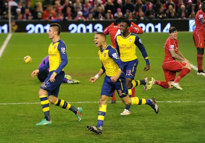 Framed Print : Giroud, Gibbs, and Welbeck: Celebrating Arsenal's Winning Moment at Anfield (Liverpool v Arsenal 2014 / 15)