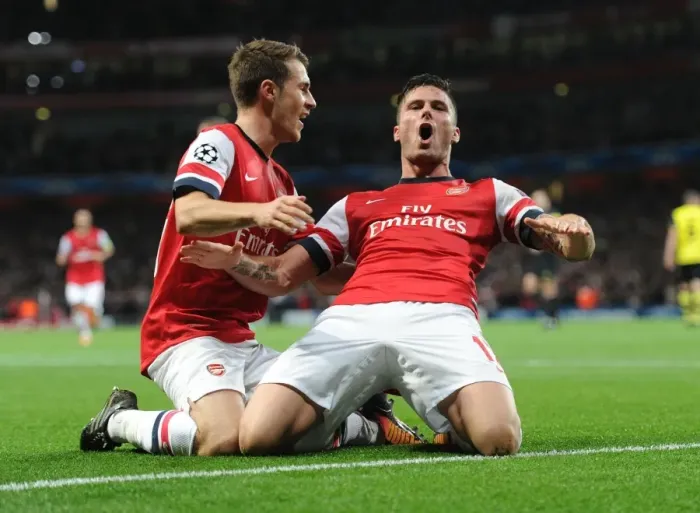 Framed Print : Giroud and Ramsey Celebrate Arsenal's Goal Against Borussia Dortmund in the 2013-14 UEFA Champions League