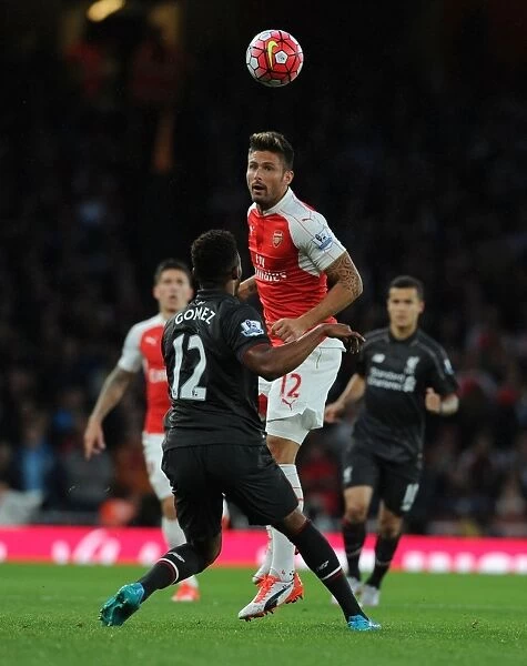 Giroud Soars Past Gomez: Intense Arsenal vs. Liverpool Clash (2015 / 16)