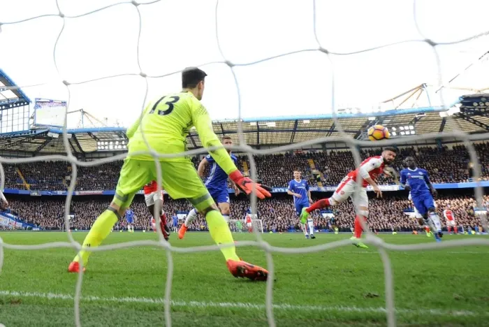 Framed Print : Giroud Strikes: Arsenal's Winning Moment Against Chelsea in the Premier League
