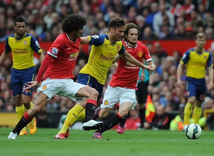 Framed Print : Giroud Surges Past Fellaini and Blind: A Pivotal Moment in the 2014-15 Manchester United vs. Arsenal Premier League Clash Framed Print : Giroud Surges Past Fellaini and Blind: A Pivotal Moment in the 2014-15 Manchester United vs. Arsenal Premier League Clash