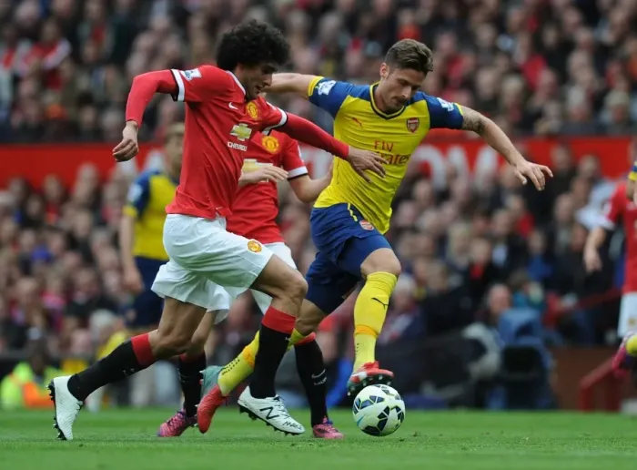 Framed Print : Giroud Surges Past Fellaini: Manchester United vs. Arsenal, Premier League 2014-15 Framed Print : Giroud Surges Past Fellaini: Manchester United vs. Arsenal, Premier League 2014-15
