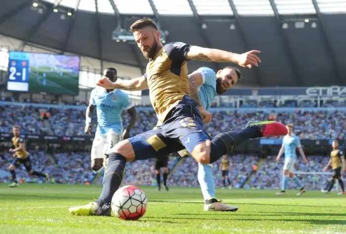 Framed Print : Giroud Surges Past Otamendi: Manchester City vs. Arsenal, Premier League Battle (2016)