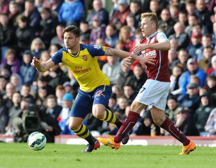 Framed Print : Giroud vs Arfield: A Premier League Battle at Turf Moor