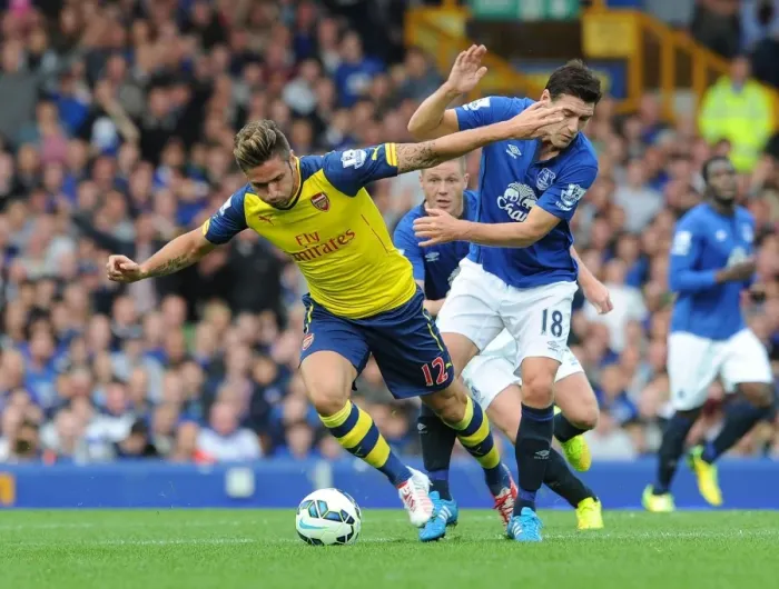 Framed Print : Giroud vs. Barry: A Football Rivalry Unfolds at Goodison Park - Everton vs. Arsenal, Premier League 2014 / 15 Framed Print : Giroud vs. Barry: A Football Rivalry Unfolds at Goodison Park - Everton vs. Arsenal, Premier League 2014 / 15