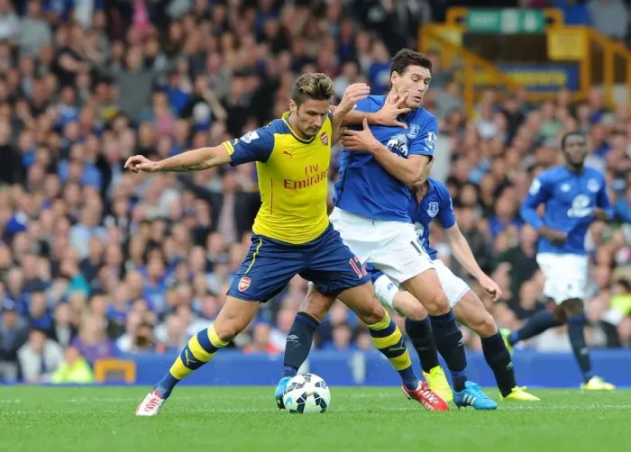 Framed Print : Giroud vs. Barry: Intense Battle at Goodison Park - Everton vs. Arsenal, Premier League 2014 / 15