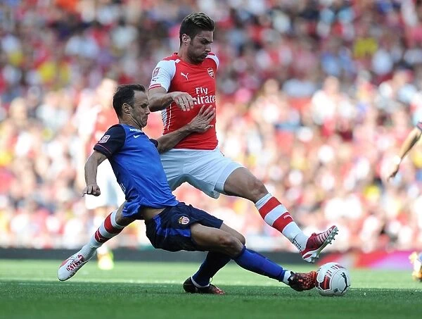 Giroud vs. Carvalho: Intense Battle at the Emirates Cup
