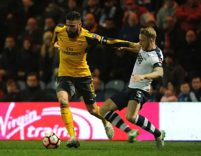 Framed Print : Giroud vs Clarke: A FA Cup Battle - Arsenal Forward Clashes with Preston Defender Framed Print : Giroud vs Clarke: A FA Cup Battle - Arsenal Forward Clashes with Preston Defender