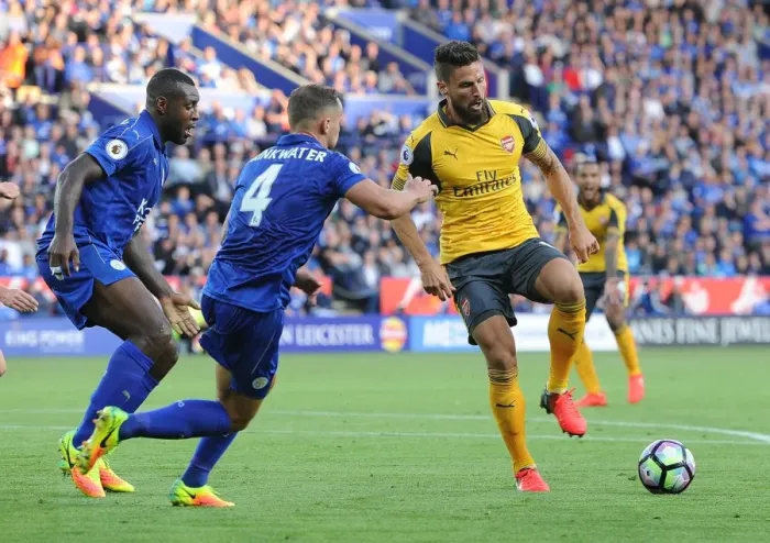 Framed Print : Giroud vs Drinkwater: A Premier League Showdown at The King Power Stadium, 2016-17 Framed Print : Giroud vs Drinkwater: A Premier League Showdown at The King Power Stadium, 2016-17