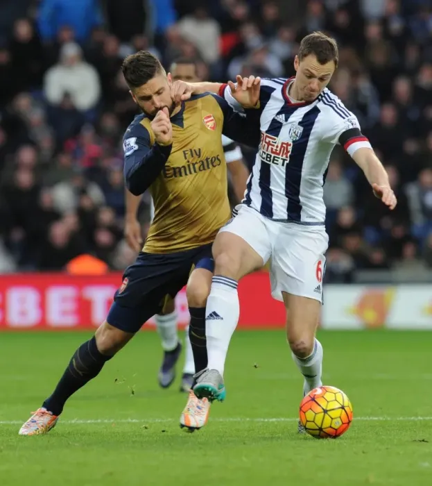 Framed Print : Giroud vs Evans: A Footballing Battle in the Premier League Clash between West Brom and Arsenal Framed Print : Giroud vs Evans: A Footballing Battle in the Premier League Clash between West Brom and Arsenal