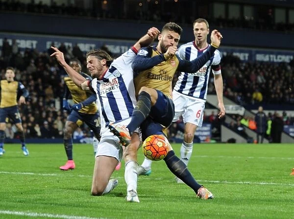 Giroud vs Evans: A Premier League Battle - Intense Tackle Between Arsenal's Star Forward and West Brom's Defender