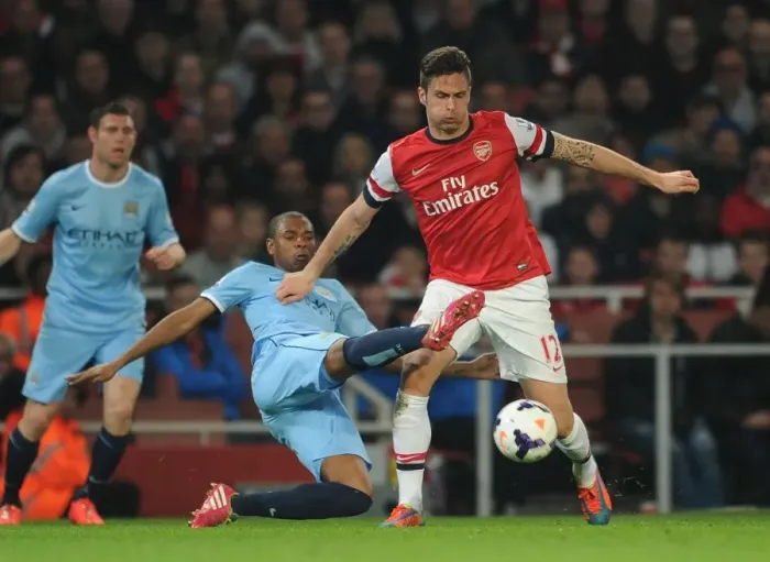 Framed Print : Giroud vs Fernandinho: A Football Rivalry - Arsenal vs Manchester City, Premier League 2013 / 14 Framed Print : Giroud vs Fernandinho: A Football Rivalry - Arsenal vs Manchester City, Premier League 2013 / 14