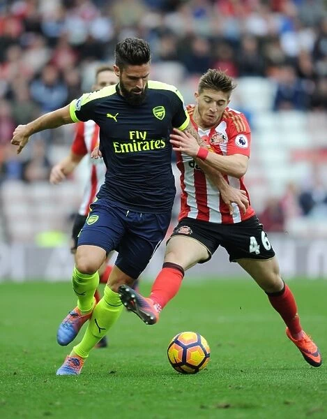 Giroud vs Gooch: Intense Clash in Sunderland v Arsenal Premier League Match, 2016-17