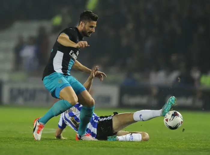 Framed Print : Giroud vs. Hutchinson: A Football Rivalry in the Capital One Cup - Sheffield Wednesday vs. Arsenal Framed Print : Giroud vs. Hutchinson: A Football Rivalry in the Capital One Cup - Sheffield Wednesday vs. Arsenal