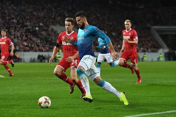 Giroud vs. Klunter: Arsenal's Star Forward Clashes with Cologne's Goalkeeper in Europa League Showdown