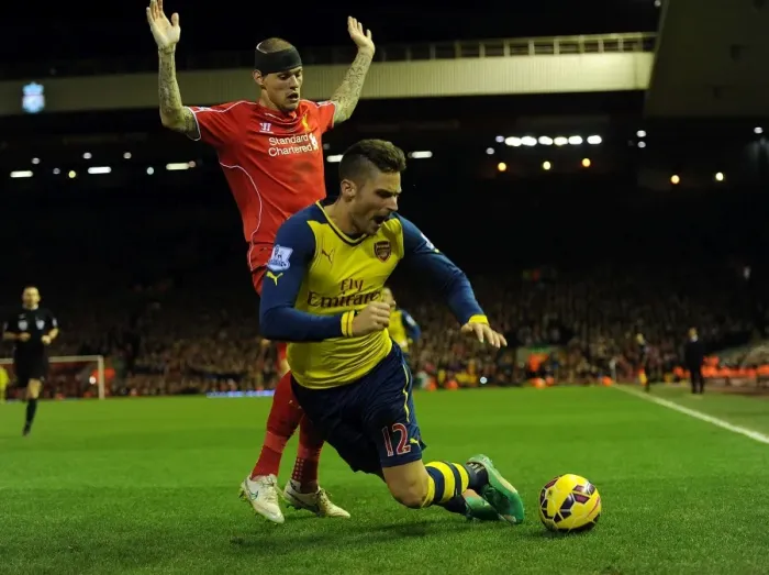 Framed Print : Giroud vs. Skrtel: A Football Rivalry Ignites at Anfield