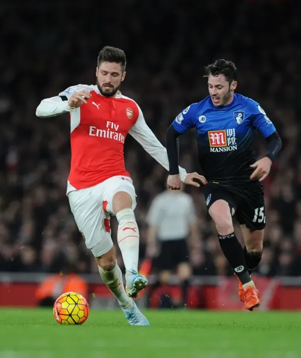 Framed Print : Giroud vs Smith: Arsenal's Star Forward Clashes with Bournemouth's Defender in Premier League Showdown (December 2015) Framed Print : Giroud vs Smith: Arsenal's Star Forward Clashes with Bournemouth's Defender in Premier League Showdown (December 2015)