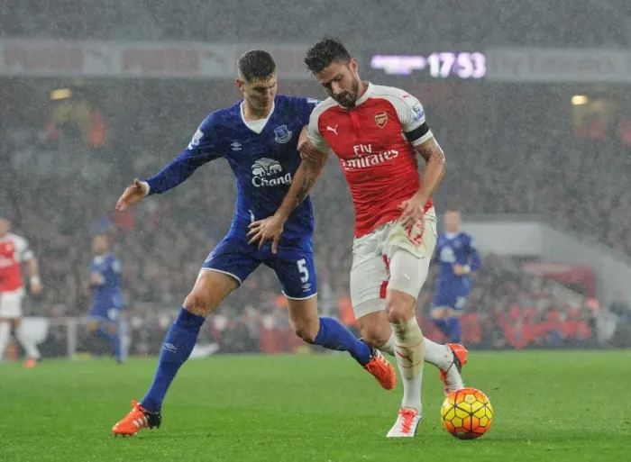 Framed Print : Giroud vs Stones: A Footballing Duel at the Emirates - Arsenal vs Everton, 2015 / 16 Premier League