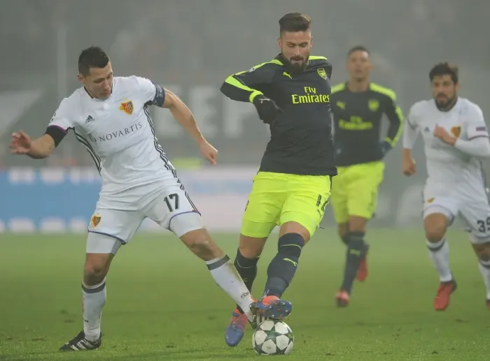 Framed Print : Giroud vs. Suchy: A Football Battle in the 2016 UEFA Champions League Clash between FC Basel and Arsenal
