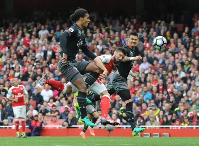 Framed Print : Giroud vs. Van Dijk & Fonte: Intense Face-Off at Arsenal's Emirates Stadium Framed Print : Giroud vs. Van Dijk & Fonte: Intense Face-Off at Arsenal's Emirates Stadium