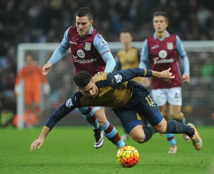 Framed Print : Giroud vs. Veretout: A Premier League Battle at Villa Park