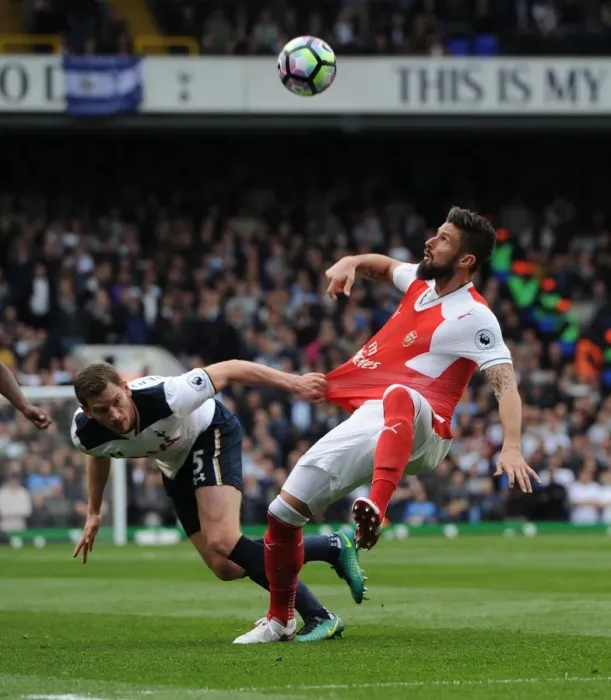 Framed Print : Giroud vs Vertonghen: Intense Rivalry in the Premier League Clash between Tottenham and Arsenal Framed Print : Giroud vs Vertonghen: Intense Rivalry in the Premier League Clash between Tottenham and Arsenal