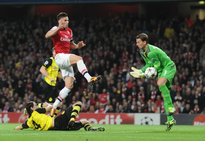 Framed Print : Giroud vs. Weidenfeller: Arsenal's Thrilling Showdown Against Borussia Dortmund in the UEFA Champions League Framed Print : Giroud vs. Weidenfeller: Arsenal's Thrilling Showdown Against Borussia Dortmund in the UEFA Champions League