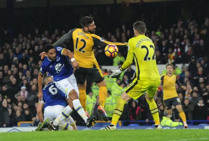 Framed Print : Giroud vs Williams: Intense Clash at Goodison Park - Everton vs Arsenal, Premier League 2016-17
