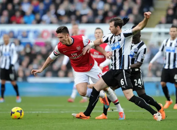 Framed Print : Giroud vs. Williamson: Intense Battle at St. James Park - Newcastle United vs. Arsenal, Premier League 2013-14 Framed Print : Giroud vs. Williamson: Intense Battle at St. James Park - Newcastle United vs. Arsenal, Premier League 2013-14