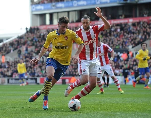 Giroud vs. Wilson: Intense Battle at Britannia Stadium - Stoke City vs. Arsenal, Premier League 2013-14
