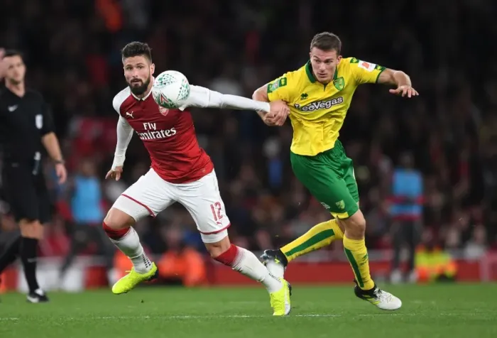Framed Print : Giroud vs. Zimmermann: A Battle of Strength in the Carabao Cup Clash between Arsenal and Norwich
