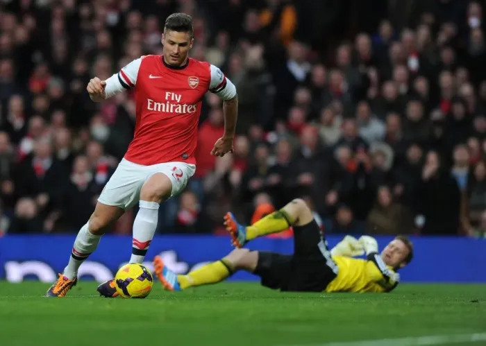 Framed Print : Giroud's Dramatic Goal: Arsenal's Thrilling Victory Over Southampton, Premier League 2013-14 - The Unforgettable Moment of Olivier's Tackle and Score