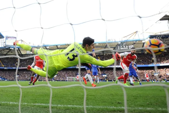 Framed Print : Giroud's Stunner: Arsenal's Upset Win Over Chelsea as Giroud Scores Past Courtois