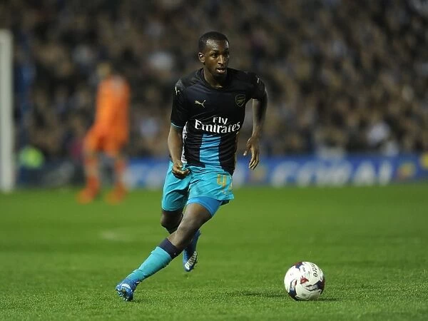 Glen Kamara in Action: Arsenal's Midfield Maestro Shines in Capital One Cup Clash against Sheffield Wednesday
